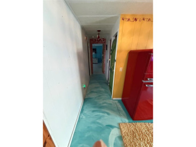 An artist retreat on the beachside!  This two bedroom, two bath on Grand Haven Golf Club in Florida - for sale on GolfHomes.com, golf home, golf lot