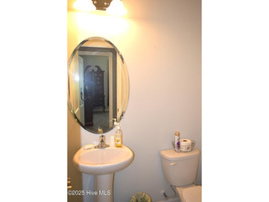 This beautifully designed unit is a true gem, AND A HUGE $$$ on Carolina Shores Golf Course in North Carolina - for sale on GolfHomes.com, golf home, golf lot