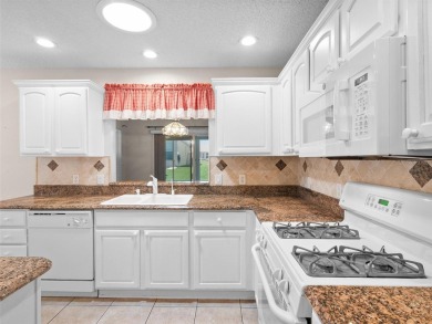 This stunning 3/2 Oleander model home in the Village of Liberty on Pelican and Heron Golf Course in Florida - for sale on GolfHomes.com, golf home, golf lot