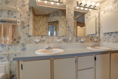 New roof coming August 2025! Move-in ready-just bring your on Barefoot Bay Golf Course in Florida - for sale on GolfHomes.com, golf home, golf lot