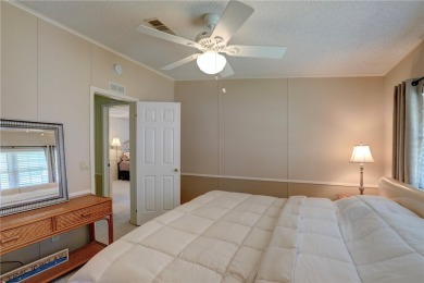 New roof coming August 2025! Move-in ready-just bring your on Barefoot Bay Golf Course in Florida - for sale on GolfHomes.com, golf home, golf lot
