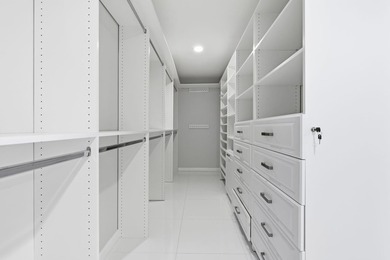 Welcome to this beautifully updated and modern 4-bedroom, 2 on Hamlet Country Club in Florida - for sale on GolfHomes.com, golf home, golf lot