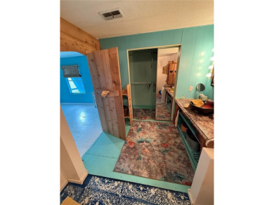 An artist retreat on the beachside!  This two bedroom, two bath on Grand Haven Golf Club in Florida - for sale on GolfHomes.com, golf home, golf lot