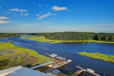 This beautifully designed unit is a true gem, AND A HUGE $$$ on Carolina Shores Golf Course in North Carolina - for sale on GolfHomes.com, golf home, golf lot