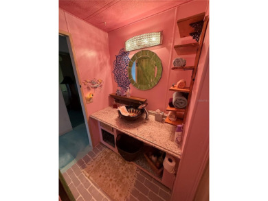 An artist retreat on the beachside!  This two bedroom, two bath on Grand Haven Golf Club in Florida - for sale on GolfHomes.com, golf home, golf lot