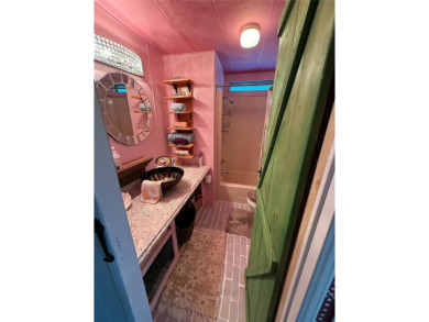 An artist retreat on the beachside!  This two bedroom, two bath on Grand Haven Golf Club in Florida - for sale on GolfHomes.com, golf home, golf lot