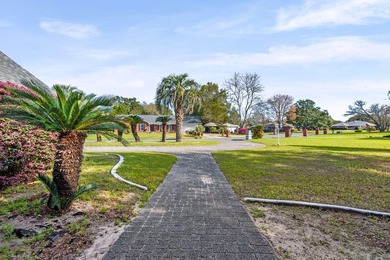 My backyard is the 12th tee box at Shalimar Pointe. Three on Shalimar Pointe Golf and Country Club in Florida - for sale on GolfHomes.com, golf home, golf lot