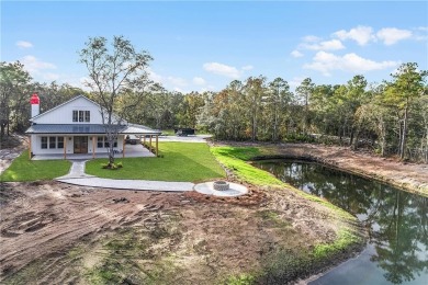 Your spectacular private low country estate on three acres is on Sapelo Hammock Golf Club in Georgia - for sale on GolfHomes.com, golf home, golf lot