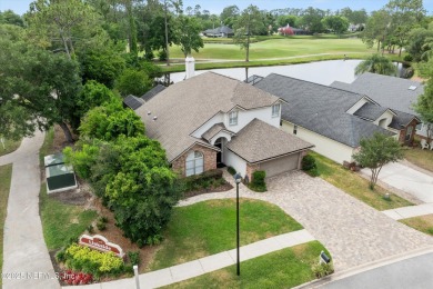 OPEN HOUSE SATURDAY MAY 31 FROM 10-1 STUNNING WATER-VIEW HOME on Eagle Harbor Golf Club in Florida - for sale on GolfHomes.com, golf home, golf lot