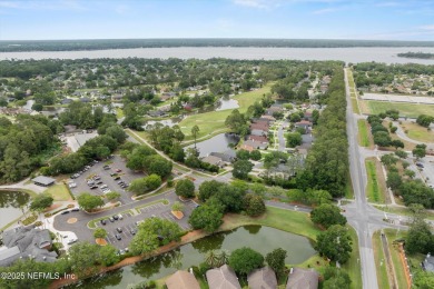 OPEN HOUSE SATURDAY MAY 31 FROM 10-1 STUNNING WATER-VIEW HOME on Eagle Harbor Golf Club in Florida - for sale on GolfHomes.com, golf home, golf lot