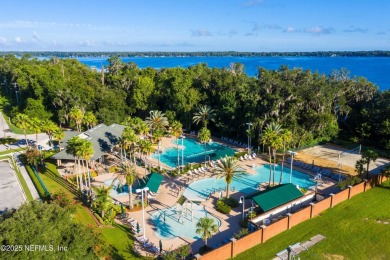 OPEN HOUSE SATURDAY MAY 31 FROM 10-1 STUNNING WATER-VIEW HOME on Eagle Harbor Golf Club in Florida - for sale on GolfHomes.com, golf home, golf lot