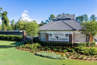 LUXURY LIFESTYLE WITH LUXURIOUS UPGRADES in Fleming Island WITH on Eagle Harbor Golf Club in Florida - for sale on GolfHomes.com, golf home, golf lot