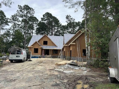 Brand-new custom home in coveted Collins Creek Landing with 5 BR on TPC Myrtle Beach Golf Club in South Carolina - for sale on GolfHomes.com, golf home, golf lot