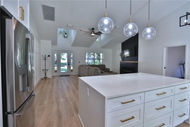 This amazing, renovated home is located in the community of The on Lakes of Lady Lake Golf Course in Florida - for sale on GolfHomes.com, golf home, golf lot