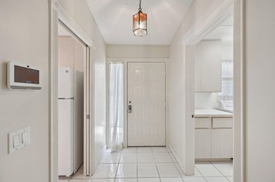 Don't miss this exceptional Divosta-built villa in highly on The Golf Club of Jupiter in Florida - for sale on GolfHomes.com, golf home, golf lot