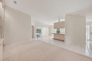 Don't miss this exceptional Divosta-built villa in highly on The Golf Club of Jupiter in Florida - for sale on GolfHomes.com, golf home, golf lot