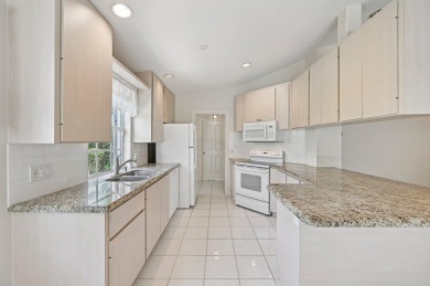 Don't miss this exceptional Divosta-built villa in highly on The Golf Club of Jupiter in Florida - for sale on GolfHomes.com, golf home, golf lot