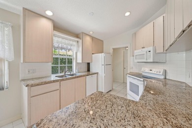 Don't miss this exceptional Divosta-built villa in highly on The Golf Club of Jupiter in Florida - for sale on GolfHomes.com, golf home, golf lot