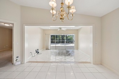 Don't miss this exceptional Divosta-built villa in highly on The Golf Club of Jupiter in Florida - for sale on GolfHomes.com, golf home, golf lot