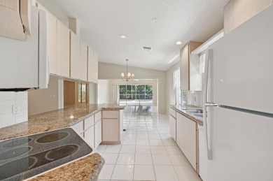 Don't miss this exceptional Divosta-built villa in highly on The Golf Club of Jupiter in Florida - for sale on GolfHomes.com, golf home, golf lot