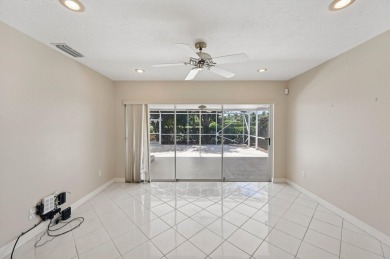 Don't miss this exceptional Divosta-built villa in highly on The Golf Club of Jupiter in Florida - for sale on GolfHomes.com, golf home, golf lot