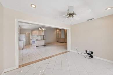 Don't miss this exceptional Divosta-built villa in highly on The Golf Club of Jupiter in Florida - for sale on GolfHomes.com, golf home, golf lot