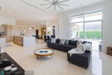 ESPECTACULAR MODERN HOME WITH SMART HOME SONOS SYSTEM, SITUATED on Weston Hills Country Club in Florida - for sale on GolfHomes.com, golf home, golf lot