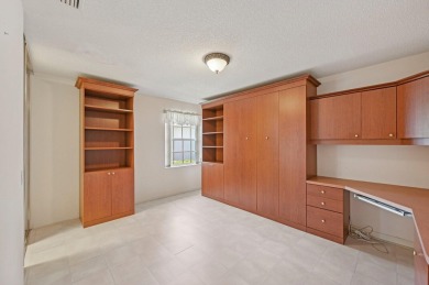 Don't miss this exceptional Divosta-built villa in highly on The Golf Club of Jupiter in Florida - for sale on GolfHomes.com, golf home, golf lot