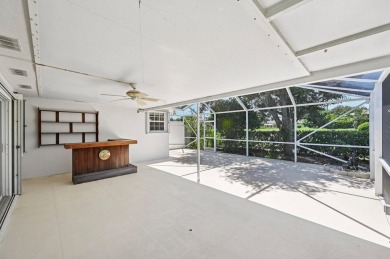 Don't miss this exceptional Divosta-built villa in highly on The Golf Club of Jupiter in Florida - for sale on GolfHomes.com, golf home, golf lot