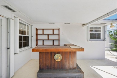 Don't miss this exceptional Divosta-built villa in highly on The Golf Club of Jupiter in Florida - for sale on GolfHomes.com, golf home, golf lot