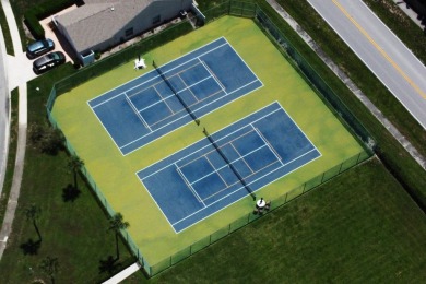 Don't miss this exceptional Divosta-built villa in highly on The Golf Club of Jupiter in Florida - for sale on GolfHomes.com, golf home, golf lot