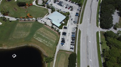 Don't miss this exceptional Divosta-built villa in highly on The Golf Club of Jupiter in Florida - for sale on GolfHomes.com, golf home, golf lot