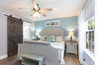 This beautifully maintained 3-bedroom, 2-bath home features a on Heron Point Golf Club in South Carolina - for sale on GolfHomes.com, golf home, golf lot