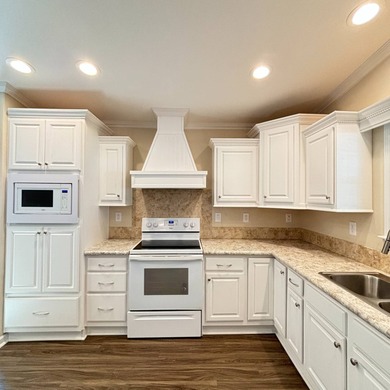 Welcome to Beach Cove, a vibrant 55+ manufactured home community on Pelican Pointe 9 Hole Course in Florida - for sale on GolfHomes.com, golf home, golf lot