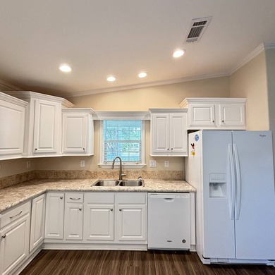 Welcome to Beach Cove, a vibrant 55+ manufactured home community on Pelican Pointe 9 Hole Course in Florida - for sale on GolfHomes.com, golf home, golf lot