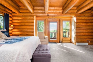 Welcome to this stunning Up North luxury log home perfectly on Boyne Mountain Resort - Monument Course in Michigan - for sale on GolfHomes.com, golf home, golf lot