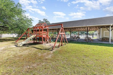 This beautifully maintained 3-bedroom, 2-bath home features a on Heron Point Golf Club in South Carolina - for sale on GolfHomes.com, golf home, golf lot