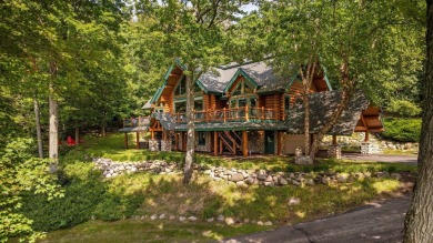 Welcome to this stunning Up North luxury log home perfectly on Boyne Mountain Resort - Monument Course in Michigan - for sale on GolfHomes.com, golf home, golf lot