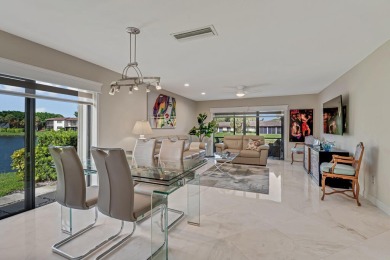 ABSOLUTELY STUNNING GROUND FLOOR CORNER UNIT! GORGEOUS BOTH on Boca Lago Golf and Country Club in Florida - for sale on GolfHomes.com, golf home, golf lot