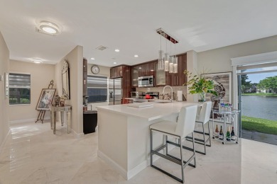 ABSOLUTELY STUNNING GROUND FLOOR CORNER UNIT! GORGEOUS BOTH on Boca Lago Golf and Country Club in Florida - for sale on GolfHomes.com, golf home, golf lot
