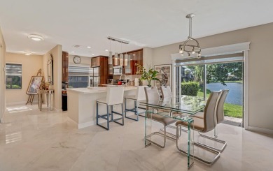 ABSOLUTELY STUNNING GROUND FLOOR CORNER UNIT! GORGEOUS BOTH on Boca Lago Golf and Country Club in Florida - for sale on GolfHomes.com, golf home, golf lot