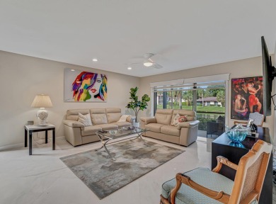 ABSOLUTELY STUNNING GROUND FLOOR CORNER UNIT! GORGEOUS BOTH on Boca Lago Golf and Country Club in Florida - for sale on GolfHomes.com, golf home, golf lot
