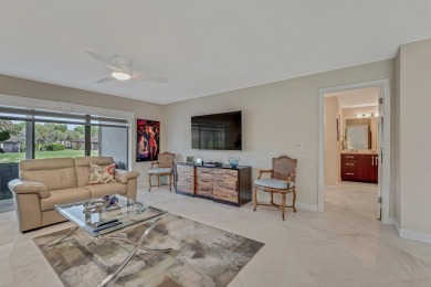 ABSOLUTELY STUNNING GROUND FLOOR CORNER UNIT! GORGEOUS BOTH on Boca Lago Golf and Country Club in Florida - for sale on GolfHomes.com, golf home, golf lot