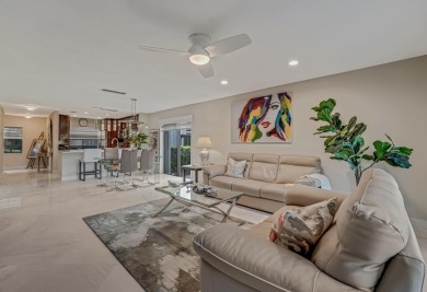 ABSOLUTELY STUNNING GROUND FLOOR CORNER UNIT! GORGEOUS BOTH on Boca Lago Golf and Country Club in Florida - for sale on GolfHomes.com, golf home, golf lot
