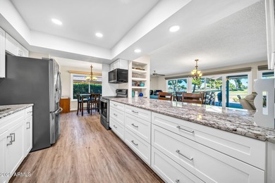 Enjoy breathtaking views of the pond, fountain, and 3rd hole of on Pebblebrook Golf Course in Arizona - for sale on GolfHomes.com, golf home, golf lot