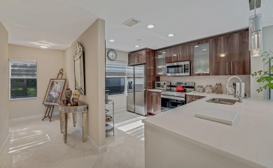 ABSOLUTELY STUNNING GROUND FLOOR CORNER UNIT! GORGEOUS BOTH on Boca Lago Golf and Country Club in Florida - for sale on GolfHomes.com, golf home, golf lot