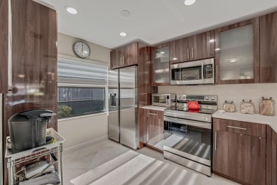 ABSOLUTELY STUNNING GROUND FLOOR CORNER UNIT! GORGEOUS BOTH on Boca Lago Golf and Country Club in Florida - for sale on GolfHomes.com, golf home, golf lot