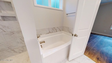 New Construction nestled along the fourth green at Pinehurst No on Pinehurst  No. 6 Golf Course in North Carolina - for sale on GolfHomes.com, golf home, golf lot