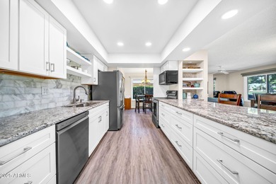 Enjoy breathtaking views of the pond, fountain, and 3rd hole of on Pebblebrook Golf Course in Arizona - for sale on GolfHomes.com, golf home, golf lot