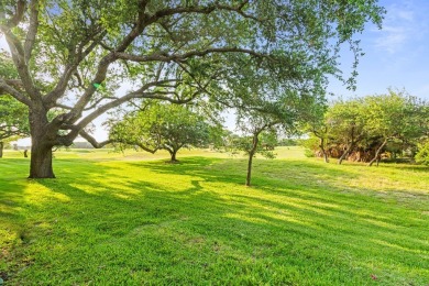 Sunset views everyday? Yes, please! This coveted end-unit on Rockport Country Club in Texas - for sale on GolfHomes.com, golf home, golf lot